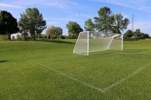 A goal post on a soccer field.